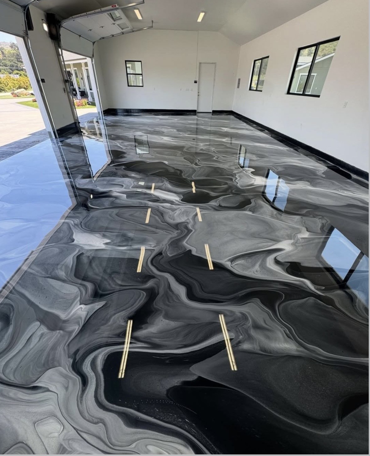 Silver & Black Metallic Garage — Metallic epoxy floor in Metro Atlanta, GA